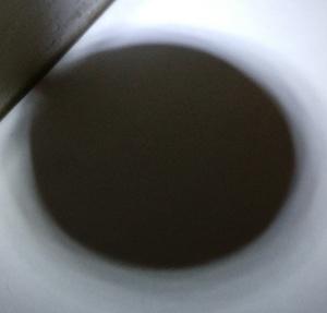 A circular shadow.