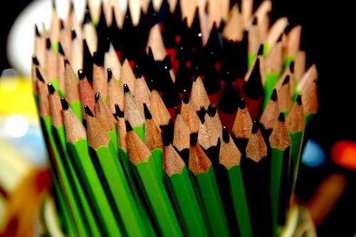 Pot of green pencils.