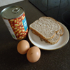 Tom learns to cook